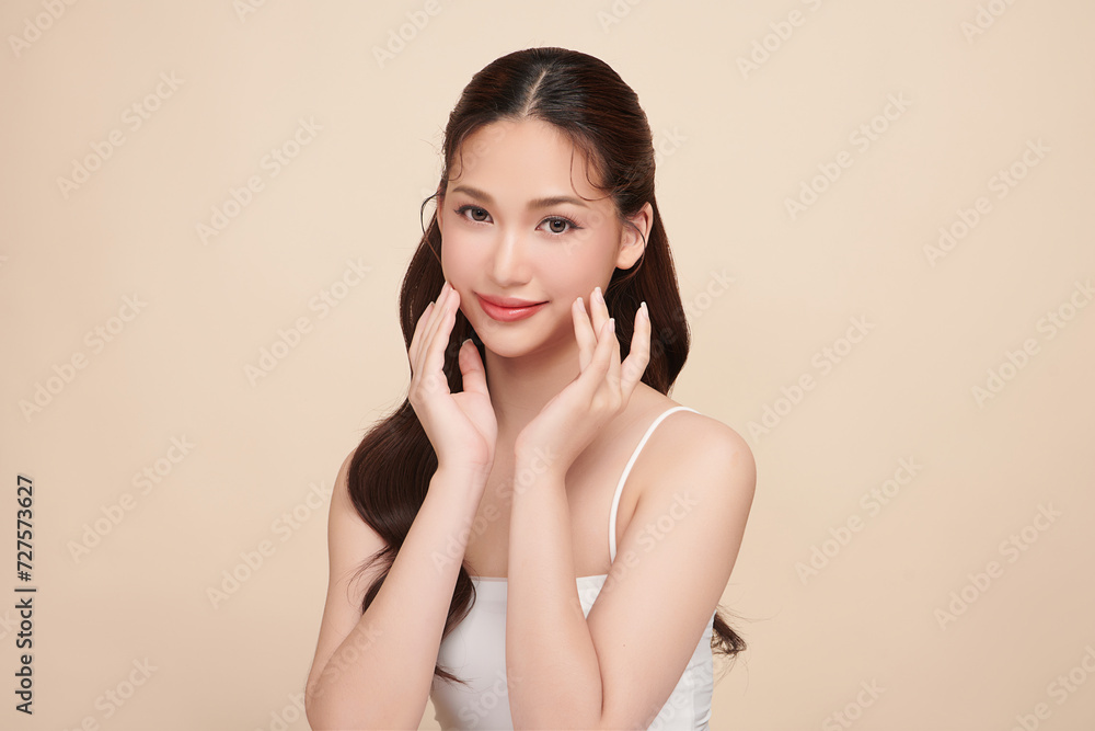 Beautiful young woman with clean fresh skin on beige background, Face care, Facial treatment, Cosmetology, beauty and spa, women portrait. Beautiful young woman with clean fresh skin on beige background, Face care, Facial treatment, Cosmetology, beauty and spa, women portrait.