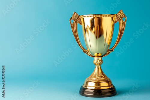 a golden trophy on the blue background