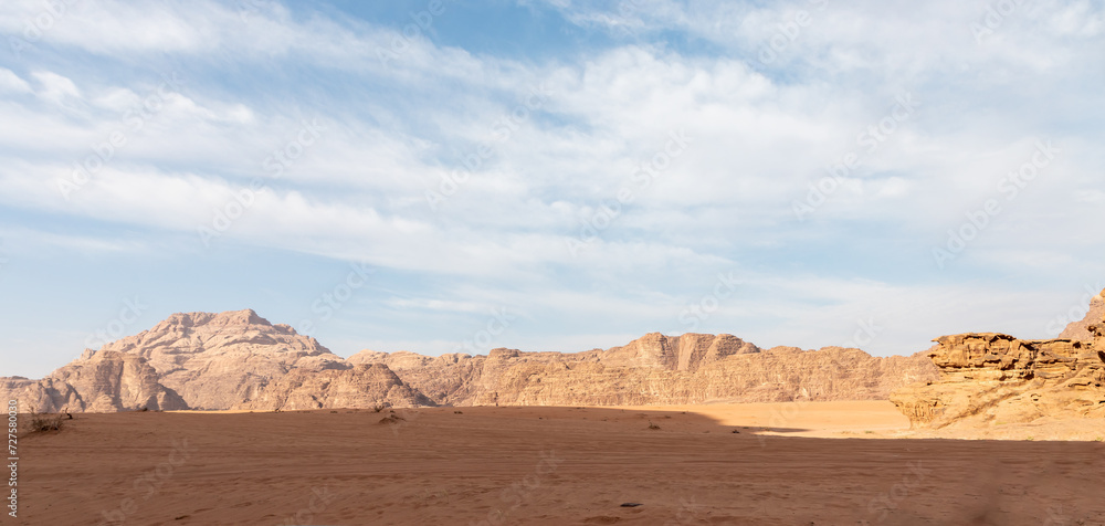 The enchanting beauty of endless sandy red desert of the Wadi Rum near Amman in Jordan