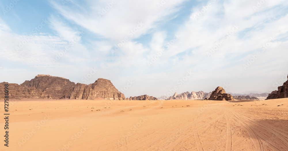 The indescribable magnificence of the vast expanses of the endless sandy red desert of the Wadi Rum near Amman in Jordan