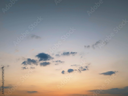 Fototapeta Naklejka Na Ścianę i Meble -  A serene view of the sky at sunset, characterized by soft, diffused lighting.