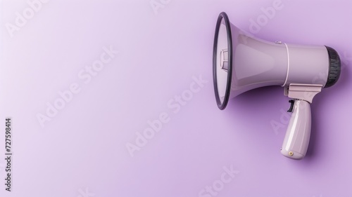 A single white megaphone lying on a plain pastel purple background