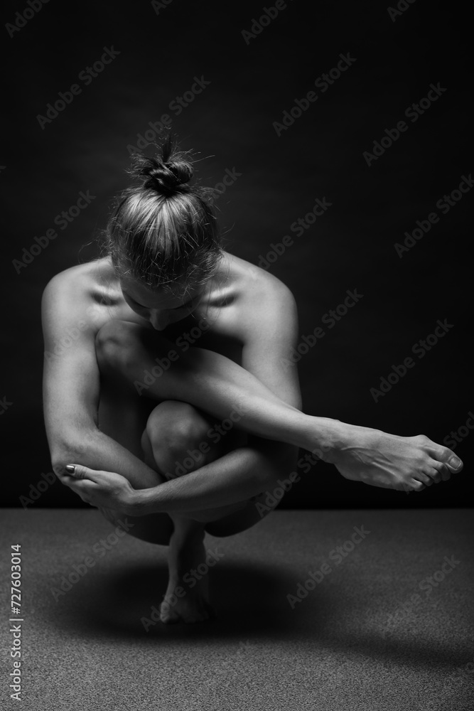 Fototapeta premium Abstract sport and medical concept. Beautiful body of yoga woman over dark background. 