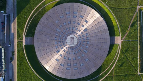 round Arena Velodrome Berlin Germany. drone top down Above view
Fabulous aerial top view flight 
Futuristic Building sun reflection. 4k footage photo