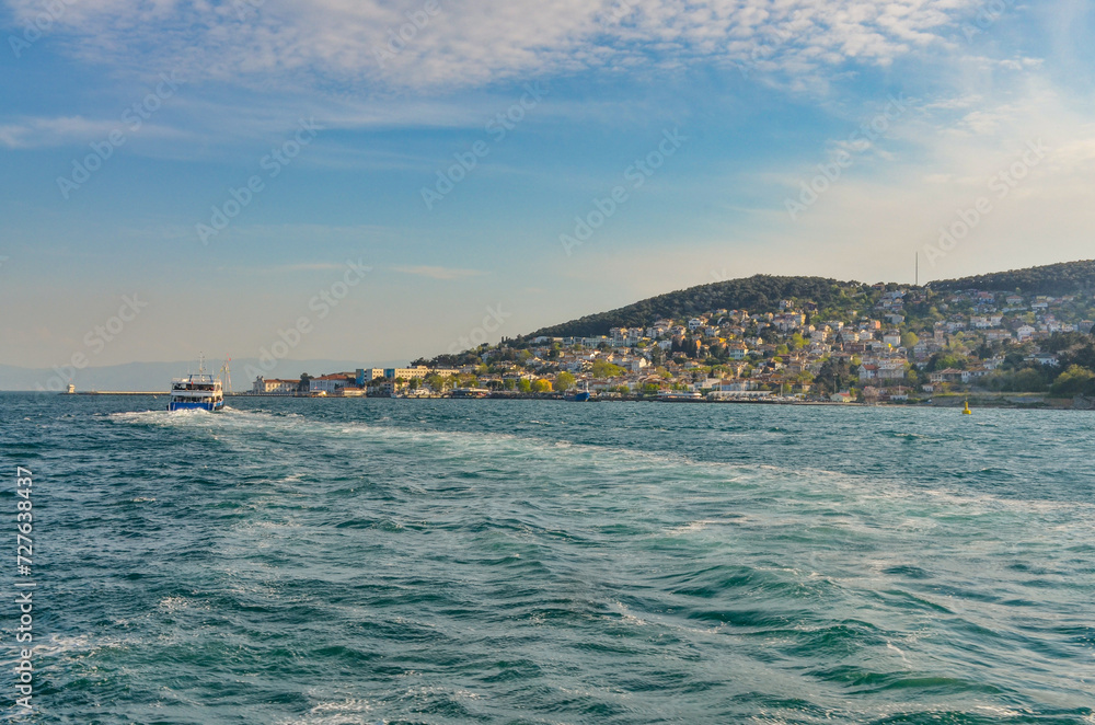 Heybeliada island and harbor view from Buyukada ferry (Adalar, Turkey) Heybeliada island and harbor view from Buyukada ferry (Adalar, Turkey)