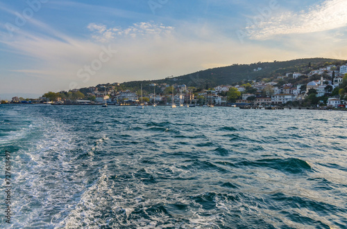 Burgazada island and harbor scenic view from Istanbul ferry boat (Adalar, Turkey) photo