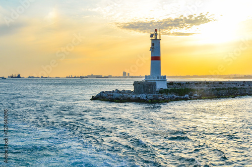 lighthouse in Kadikoy harbor on Anatolian side of Istanbul evening view photo