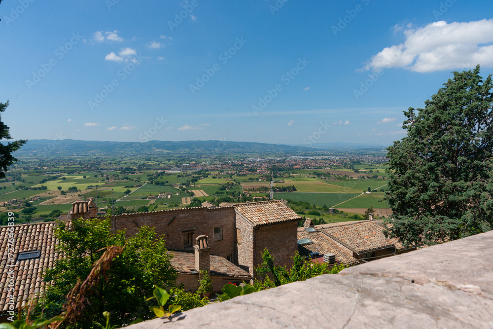 Landscape view over tiled roofs of village homes in Assissi