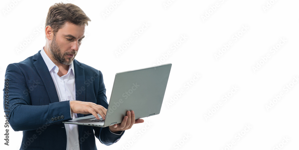 Millennial man working on laptop in studio. Hispanic man checking information on laptop, typing information on laptop. Middle aged man searching information on laptops. Banner, poster for web. Millennial man working on laptop in studio. Hispanic man checking information on laptop, typing information on laptop. Middle aged man searching information on laptops. Banner, poster for web.