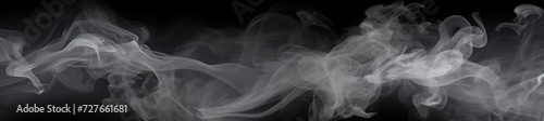 A black and white photo capturing smoke billowing against a black background.