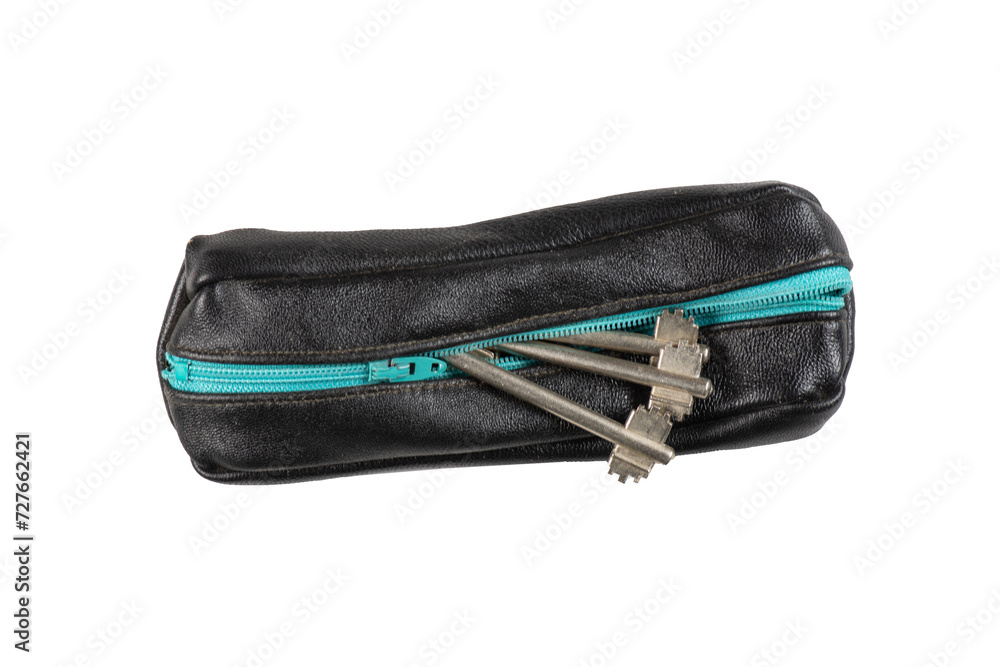 Black leather key holder on white background. Open the door of the house. Black leather key holder on white background. Open the door of the house.
