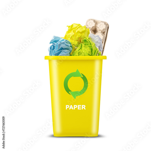 Yellow trash can. With a recycling icon for paper. Isolated on a white background. Garbage sorting. Ecology. Garbage recycling. Recycling. photo