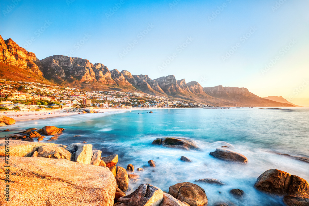 Cape Town Sunset over Camps Bay Beach with Table Mountain and Twelve Apostles in the Background