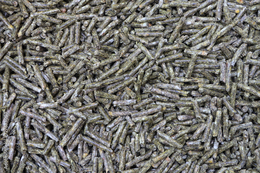 Granulated animal feed in the video of elongated sticks Granulated animal feed in the video of elongated sticks