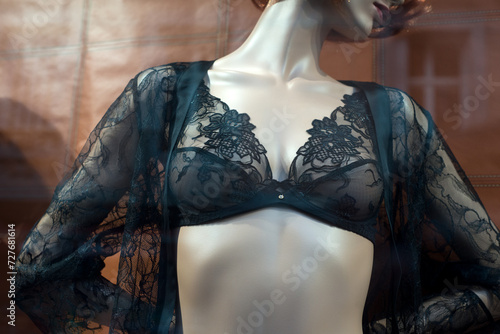 Closeup of black bra on mannequin in a fashion store showroom
