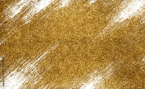 Golden paint brush stroke glittering texture.