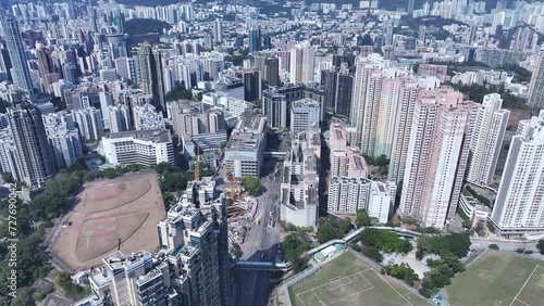 Aerial drone Skyview shot in Tsim Sha Tsui Whampoa Hung Hom commercial area, Hong Kong Victoria Harbour Financial Kowloon Peninsula and Central Wan Chai Causeway Bay photo