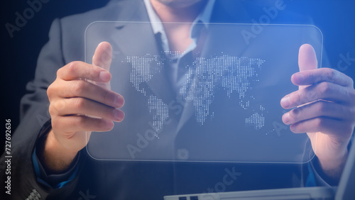 Cg collage businessman showing transparent tablet with digital world map.