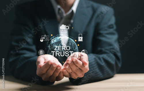 Zero trust security concept, Businessman holding virtual zero trust icon for business information security network.