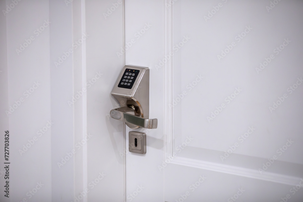Close up of combination lock on white door Close up of combination lock on white door