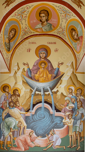The icon painted on the wall representing the Healing Spring, at the Marginea monastery - Romania photo