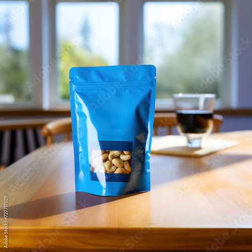 Cashews zip lock packet and cashews in the plate on table