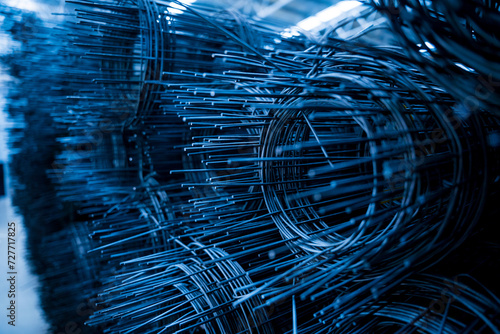 A rolls of wire mesh in the showroom of a large store. photo