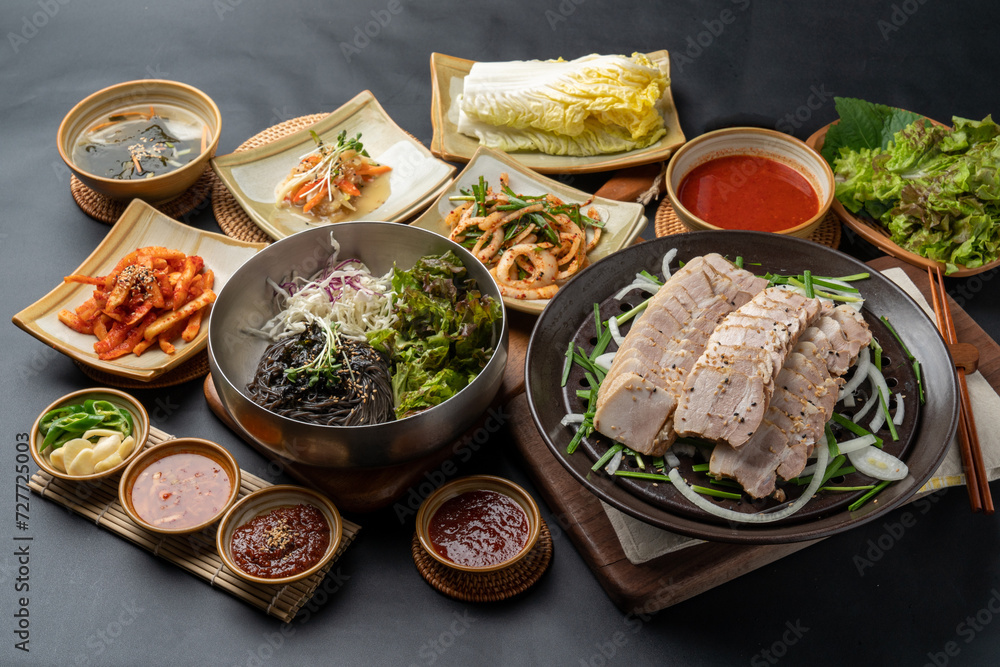 Korean food, jokbal, pork, pork feet, bossam, boiled pork, side dishes, kimchi, steam, marinade, lettuce, vegetables, salted shrimp, Korean food, jokbal, pork, pork feet, bossam, boiled pork, side dishes, kimchi, steam, marinade, lettuce, vegetables, salted shrimp,