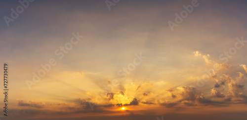 cloudy golden hour sky and sunrising with silver lining nature panorama background
