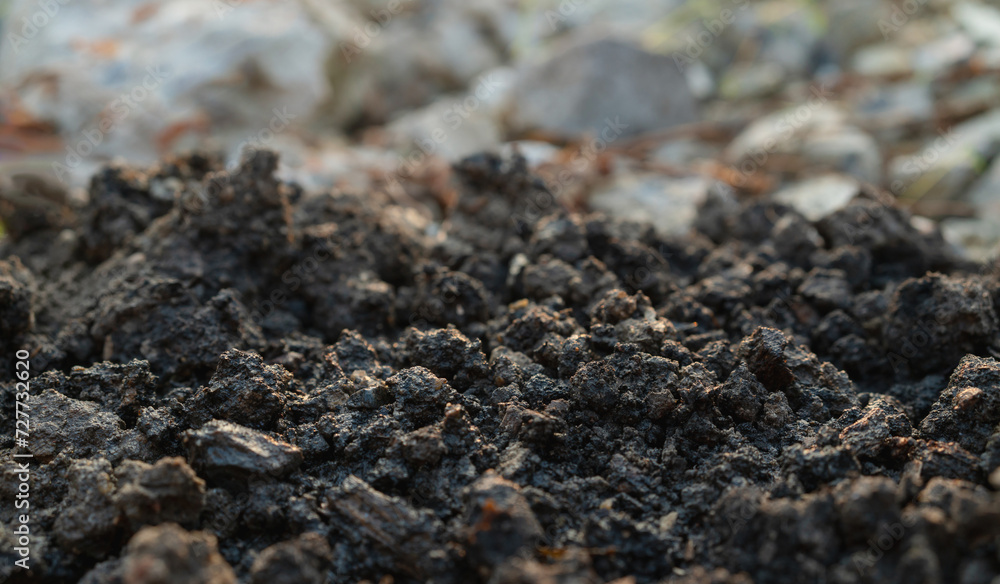 Pile of dirt on a rocky mountain Pile of dirt on a rocky mountain