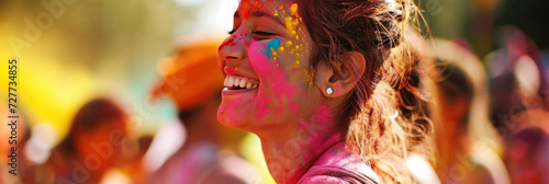 Festival of colors Holi. Happy Hindus celebrate Holi by throwing colorful powder at each other. Close-up. Copy space