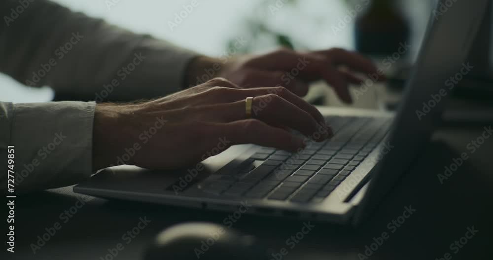 Hands of businessman typing on laptop at office Hands of businessman typing on laptop at office