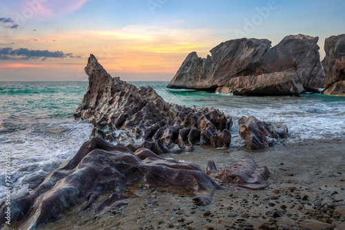 Breezy Morning Gadani Beach with rocks and mountain Balochistan Pakistan photo