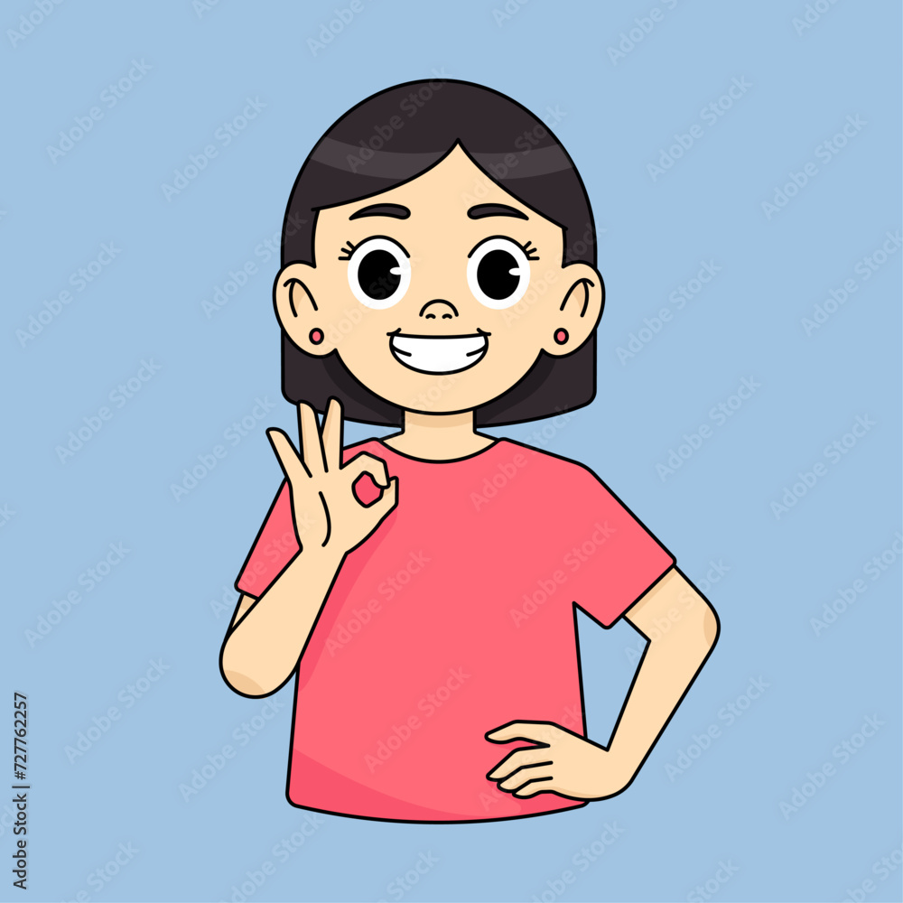 The girl smiles and shows an approving OK gesture and recommends something good The girl smiles and shows an approving OK gesture and recommends something good