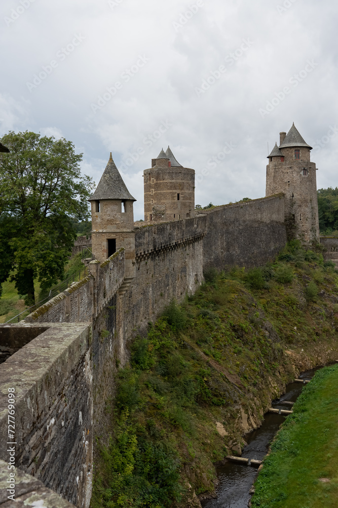 stonework of an aged medieval castle, the Chateau de Fougeres, France stonework of an aged medieval castle, the Chateau de Fougeres, France