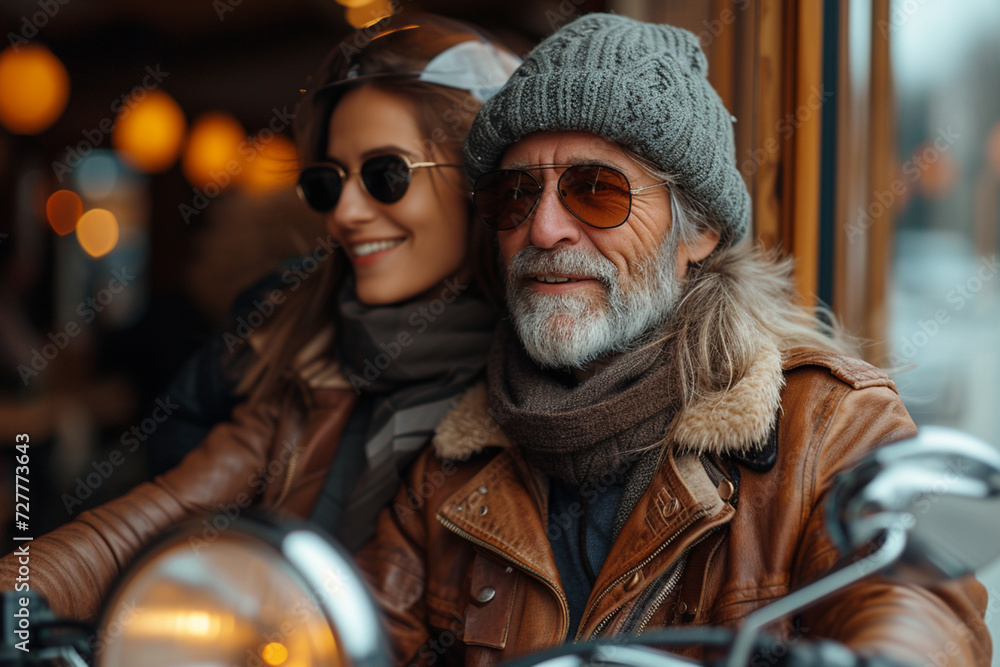 A happy couple of two loving people in sunglasses against the background of the bokeh of the city smiles and enjoys life, and the beautiful faces of these women and men radiate a positive mood. A happy couple of two loving people in sunglasses against the background of the bokeh of the city smiles and enjoys life, and the beautiful faces of these women and men radiate a positive mood.