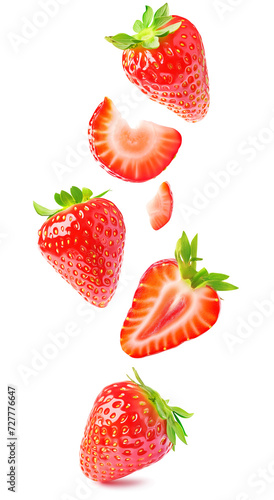 Vibrant cut strawberries with lush green tops levitation on white background