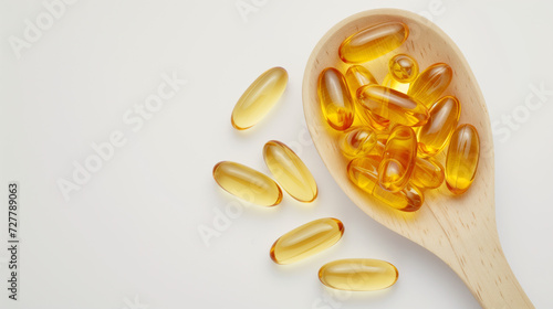 fish oil capsules on a wooden spoon, supplements, medication, healthcare, illness, pharmaceutical, omega vitamins, cod liver oil, 