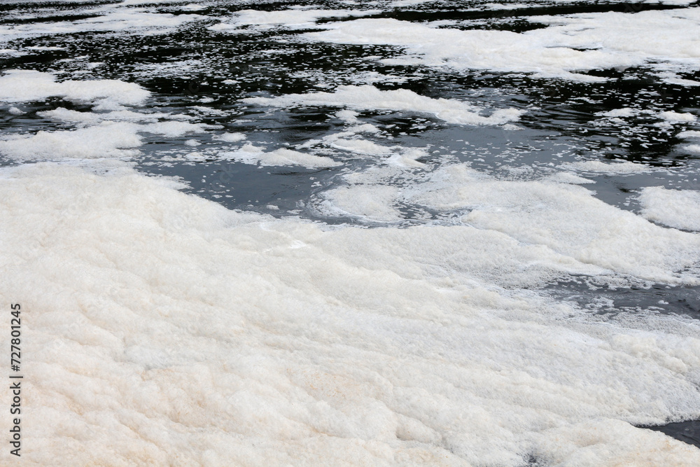 Foam on the surface of a river.