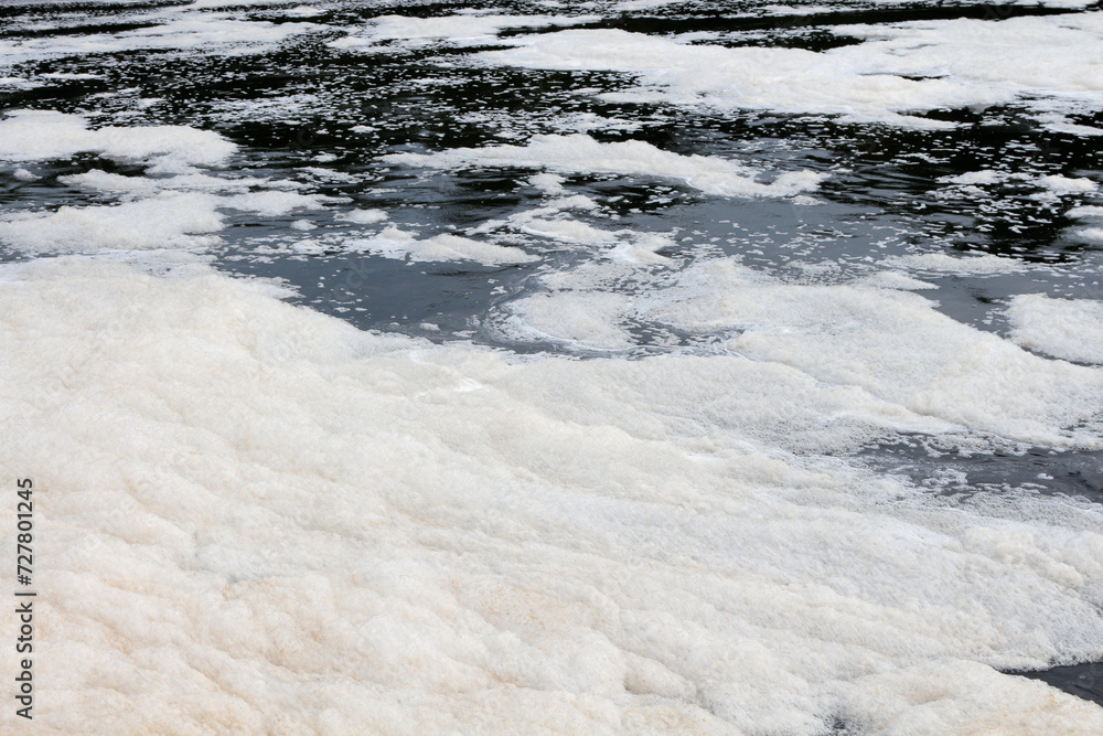 Foam on the surface of a river. Foam on the surface of a river.