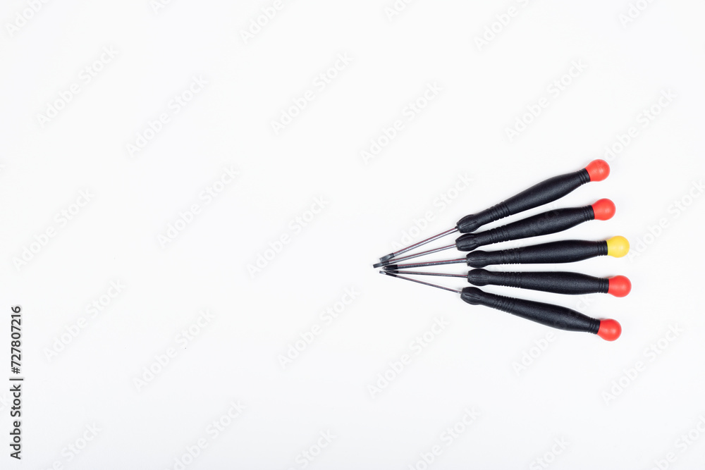 Colorful screwdrivers on a white background