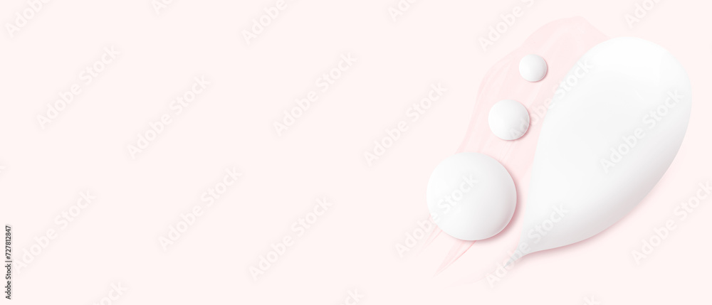 Set of cream strokes on a pink background. Empty space