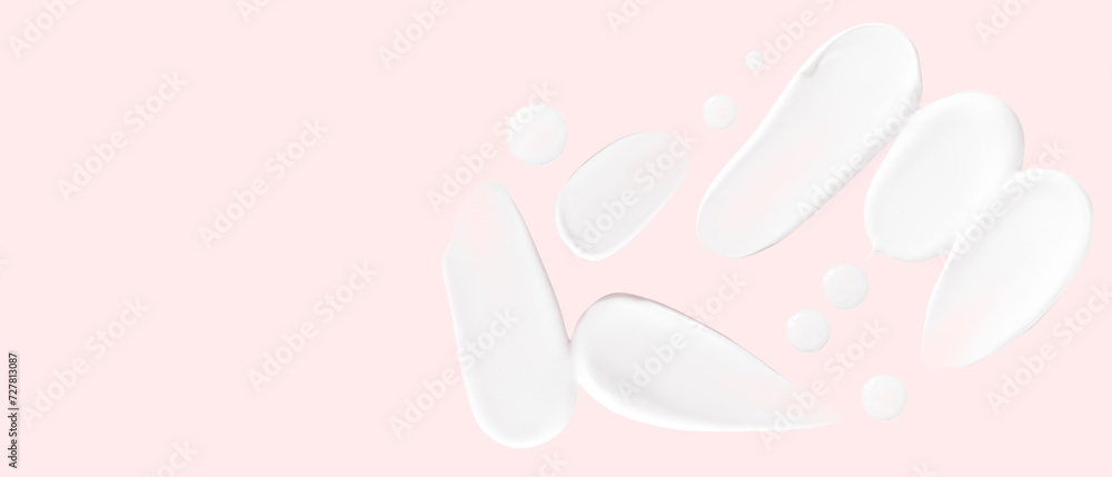 Set of smears of cream and drops of transparent gel on a pink background. Empty space Set of smears of cream and drops of transparent gel on a pink background. Empty space