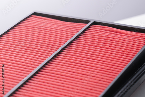 Air filter for internal combustion engine close-up. Paper air filter of car engine isolated on white background with clipping. path new car engine air filter, on white background