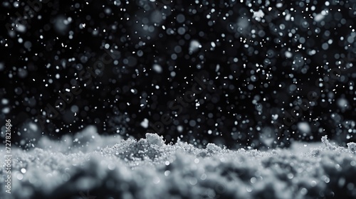 A black and white photo capturing the beauty of falling snow. Perfect for winter-themed projects and seasonal designs