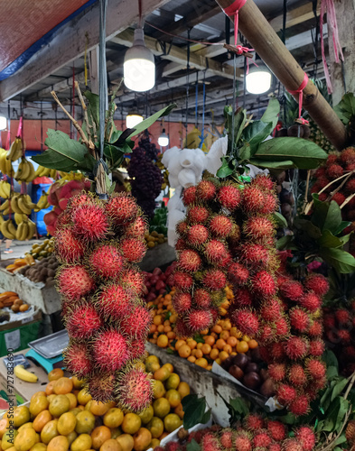 Fresh and ripe rambutan sweet tropical fruit peeled rambutan with leaves, 