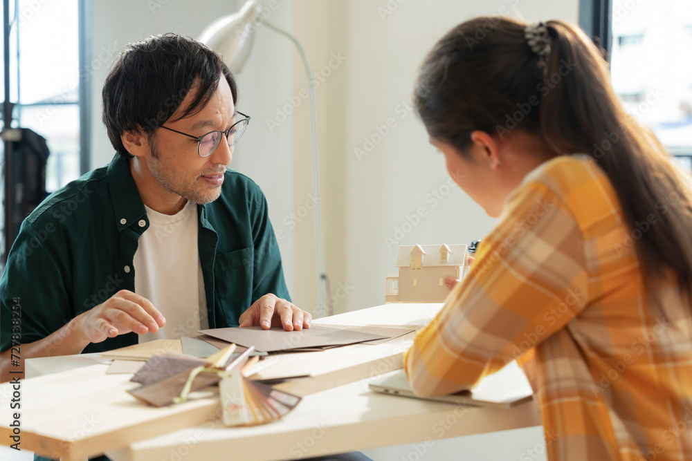 concentrate Stress Japanese asian male and woman working with laptop at home with unhappy negative work project trouble sad anxiety worry serious working from home concentrate Stress Japanese asian male and woman working with laptop at home with unhappy negative work project trouble sad anxiety worry serious working from home