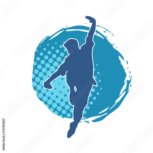 Silhouette of a man in oriental martial art pose. Silhouette of a male in martial art move.