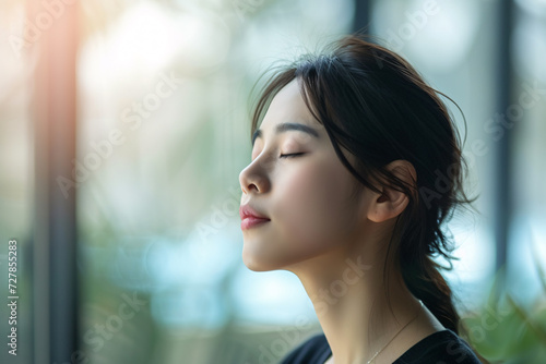 Wallpaper Mural Breathing exercise, being in the moment, mindfulness concept, a woman taking a deep breath Torontodigital.ca