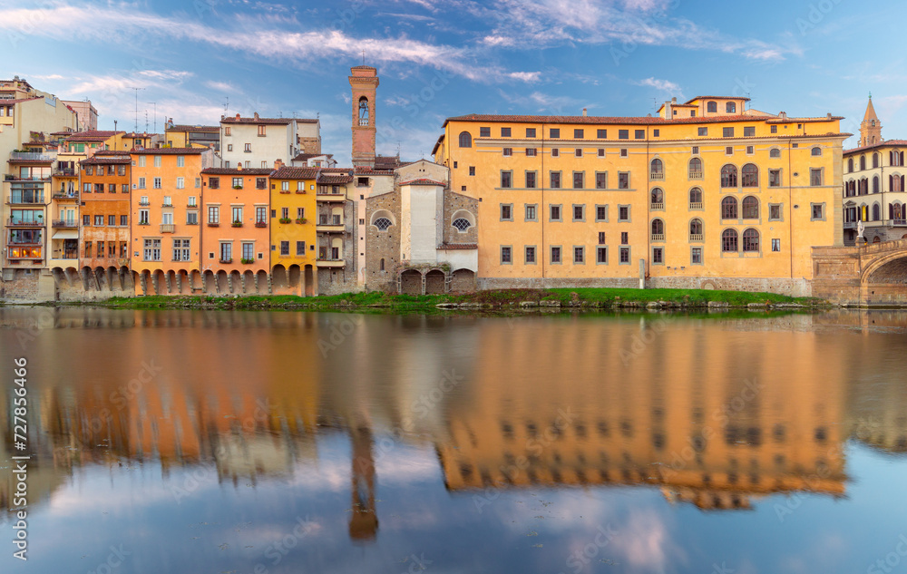 Old stone houses on the banks of the Arno river Florence early in the morning.